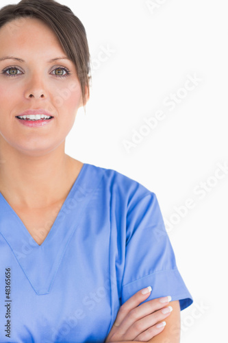 Photo: Portrait of smiling nurse with arms crossed Portrait of smiling nurse with arms crossed