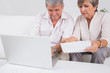 Old couple not understanding the accounts and using laptop
