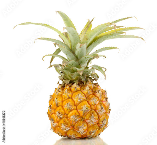 Photo: Ripe pineapple isolated on white Ripe pineapple isolated on white
