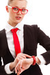 woman looking at camera and holding watch on hand