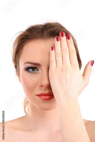 Photo: beautiful young woman covers her face beautiful young woman covers her face