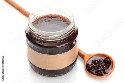 Photo: tasty berry jam, isolated on white tasty berry jam, isolated on white