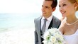 Video: Bride and groom walking on a sandy beach Bride and groom walking on a sandy beach