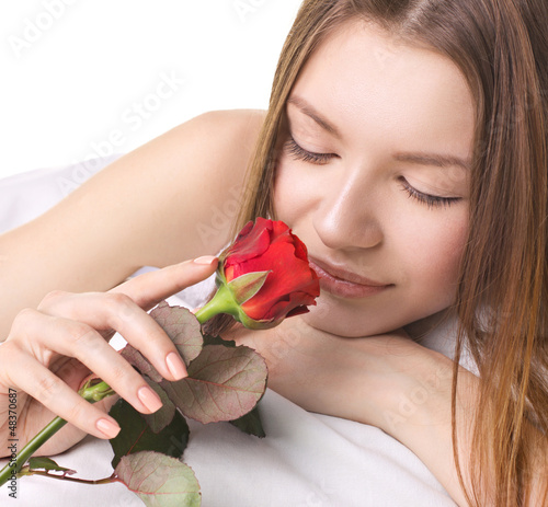 Photo: young woman with rose young woman with rose