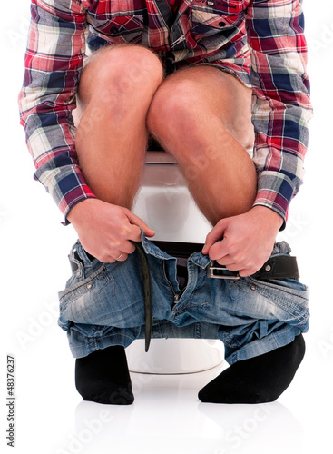 Photo: Man on toilet bowl Man on toilet bowl