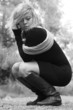 BW - Blonde woman posing at the woods