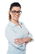 Bespectacled lady striking pose sideways