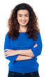 Cheerful woman in trendy blue top and jeans