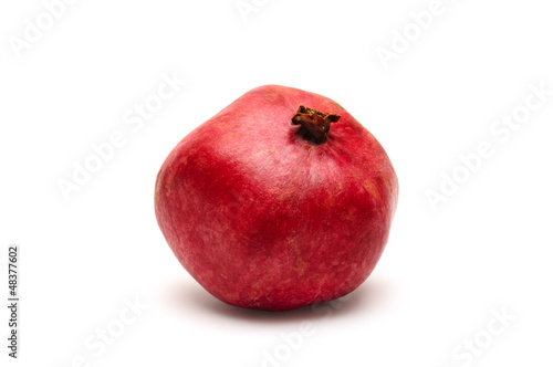 Photo: pomegranate isolated on white background pomegranate isolated on white background