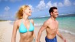Video: Couple running on sandy beach in caribbean island Couple running on sandy beach in caribbean island