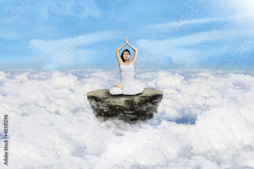 Photo: Meditation yoga above clouds Meditation yoga above clouds