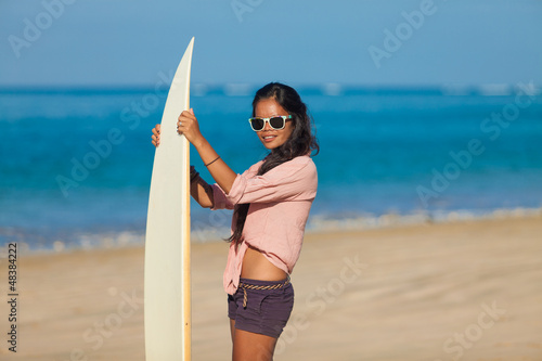 Photo: woman with surfboard woman with surfboard