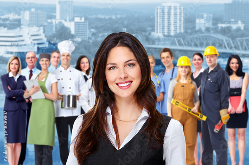 Photo: Business woman and group of workers people. Business woman and group of workers people.