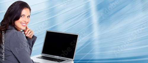 Photo: Business woman with laptop, computer. Business woman with laptop, computer.