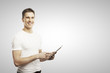 man holding tablet