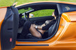 Foto: The sexual woman in car salon The sexual woman in car salon