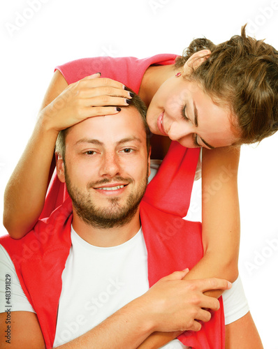 Photo: Young man and woman together over white background Young man and woman together over white background