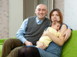 Family of three with newborn baby