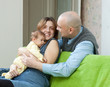 Smiling parents  with newborn