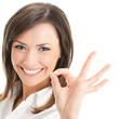 Businesswoman with okay gesture, isolated