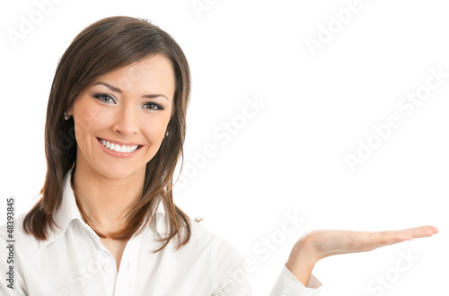 Photo: Businesswoman showing, isolated on white Businesswoman showing, isolated on white