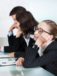 Photo: Bored businesswoman sleeping in a meeting Bored businesswoman sleeping in a meeting