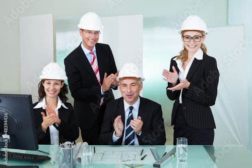Photo: Cheering architectural team Cheering architectural team