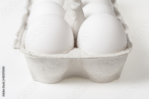 Photo: detail photo of open container with eggs detail photo of open container with eggs
