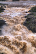 Flooded Barron River entering the Barron River Gorge
