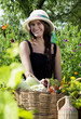 Photo: Portrait of young woman in the garden Portrait of young woman in the garden