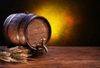 Old oak barrel on a wooden table.
