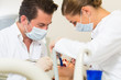 Patient with Dentist - dental treatment