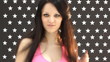 Portrait of young dancing woman with long flowing hair