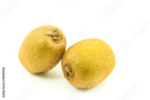 Photo: Kiwi healthy fruit isolated on the white. Kiwi healthy fruit isolated on the white.