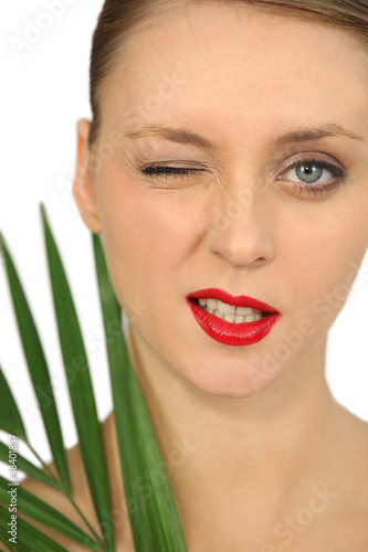 Photo: Woman doing a wink Woman doing a wink