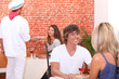 waiter working at a pizza restaurant