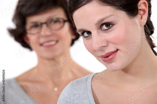 Photo: Mother and daughter wearing matching sweater Mother and daughter wearing matching sweater