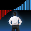 Business man backside with graph