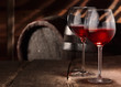Two glasses of red wine on a table