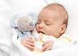 Baby sleeping in bed