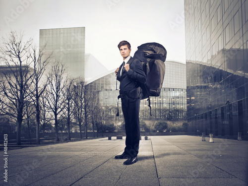 Photo: businessman with backpack businessman with backpack
