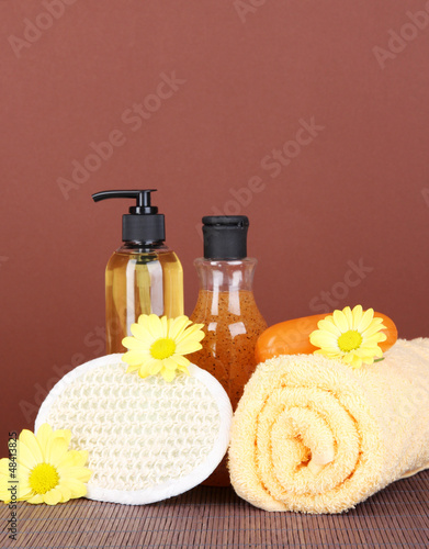 Photo: Set for care of a body on brown background Set for care of a body on brown background