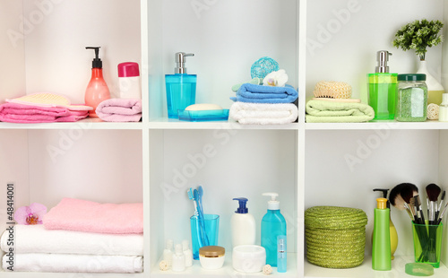 Photo: Bath accessories on shelfs in bathroom Bath accessories on shelfs in bathroom