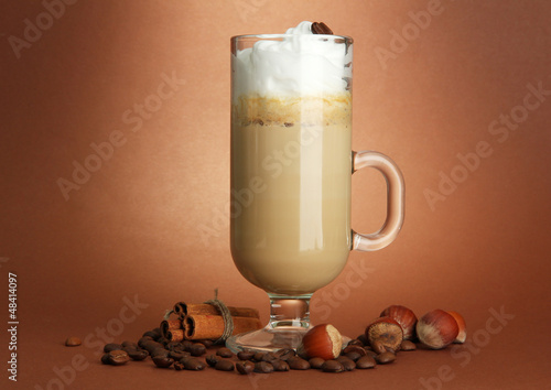 Photo: Fragrant coffee latte in glass cup with spices, Fragrant coffee latte in glass cup with spices,