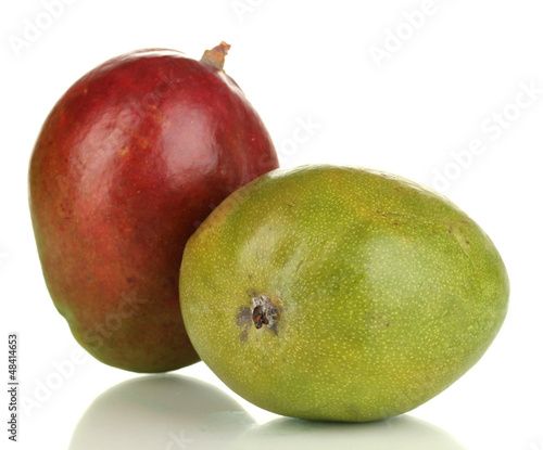 Photo: Ripe appetizing mango isolated on white Ripe appetizing mango isolated on white