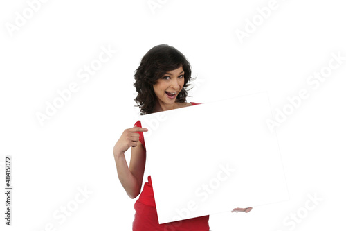 Photo: Pointing brunette white panel Pointing brunette white panel