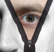 Unzipping black and white face to a colored face