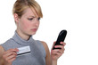 Woman calling her bank.