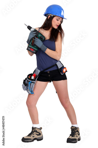 Photo: Women and drilling tools Women and drilling tools