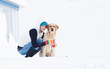 Photo: Girl in winter suit on a walk with her labrador. Girl in winter Girl in winter suit on a walk with her labrador. Girl in winter